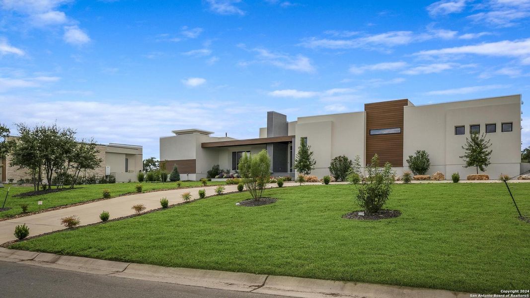 Front exterior of a new home in , San Antonio, TX, highlighting curb appeal (Image 29).