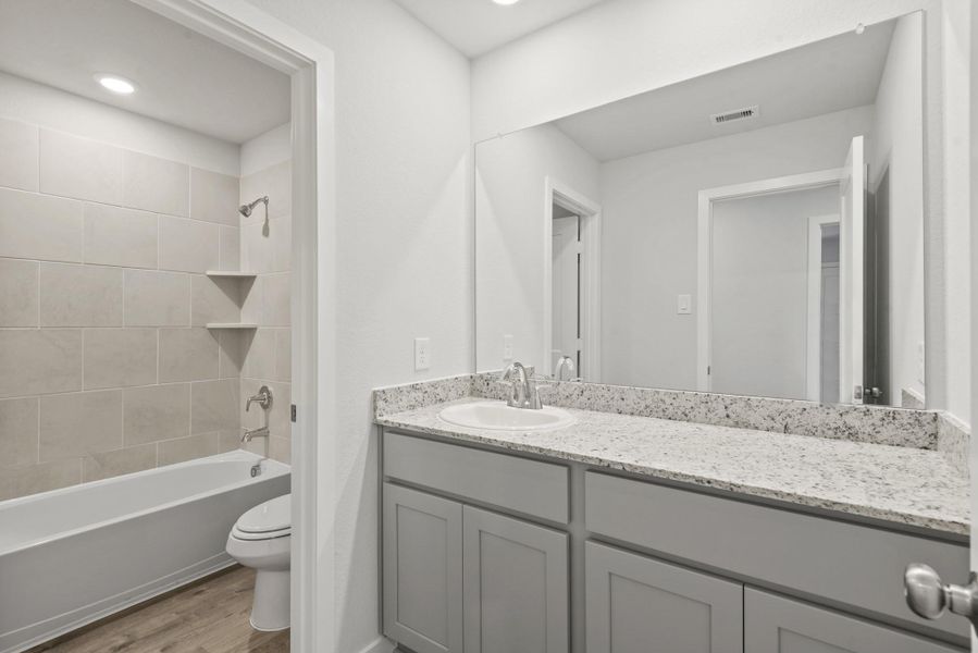 Furnished interior view inside a new home in Barrett Crossing, Crosby (Image 11).