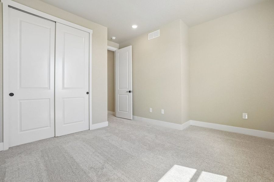 Spacious, unfurnished interior of a new home in Jackson Creek North, Monument (Image 53).