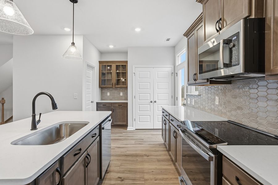 Furnished interior view inside a new home in Renaissance at White Oak, Garner (Image 13).