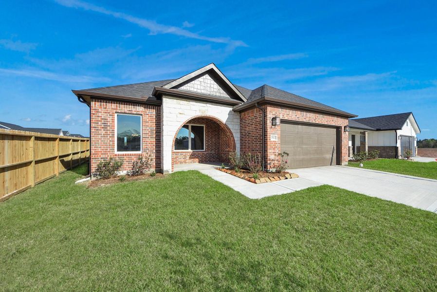 Front exterior of a new home in Hill & Dale Ranch, Splendora, TX, highlighting curb appeal (Image 21).