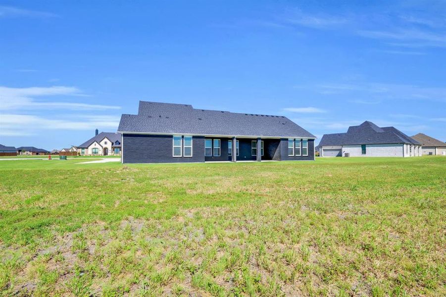 Exterior details and patio area of a home in Springside Estates II, Waxahachie (Image 21). Exterior details and patio area of a home in Springside Estates II, Waxahachie (Image 21).