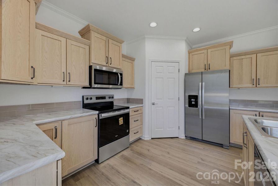Furnished interior view inside a new home in , Newton (Image 11).