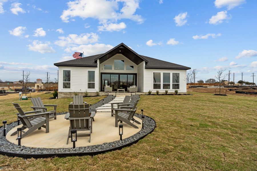 Representative exterior photo of a completed home built from the Silas by Chesmar Homes in Sienna Lakes, San Antonio, TX (Image 11).