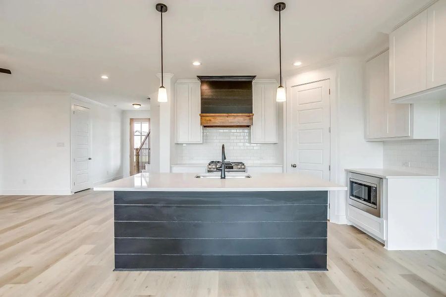 Representative furnished interior of a home built from the The Brazos by Elmwood Custom Homes in Ranch at Stone Hill, Waxahachie (Image 11). Representative furnished interior of a home built from the The Brazos by Elmwood Custom Homes in Ranch at Stone Hill, Waxahachie (Image 11).