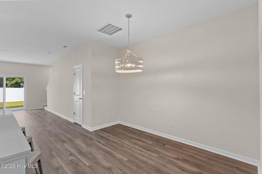 Spacious, unfurnished interior of a new home in Coastal Haven Townes, Leland (Image 17).