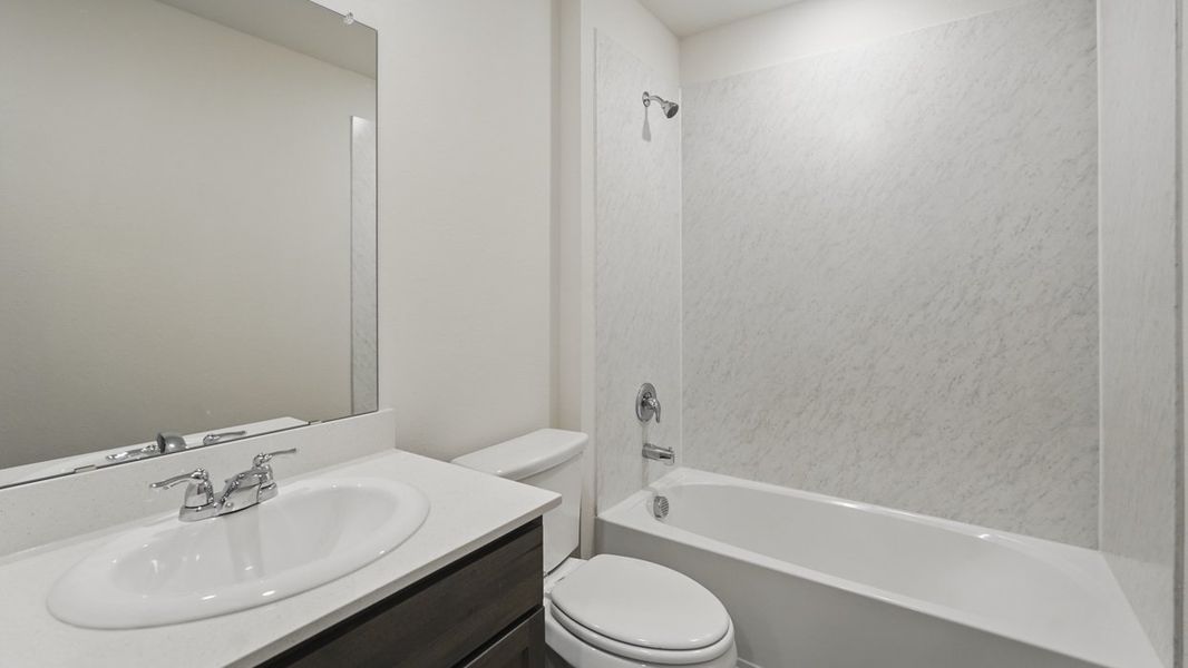 Furnished interior view inside a new home in Crane Crossing, Crandall (Image 7).