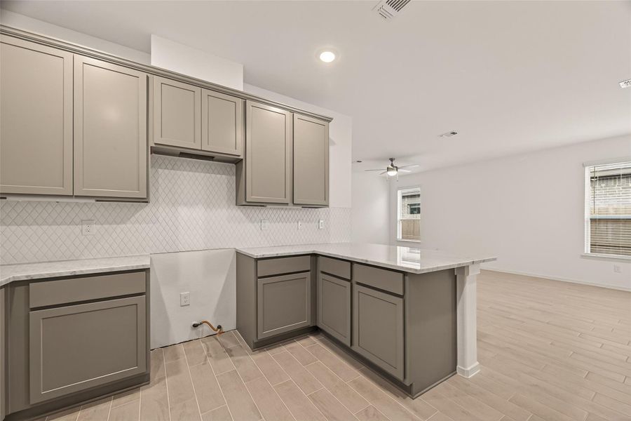 Furnished interior view inside a new home in Rates starting as low as, Iowa Colony (Image 9).