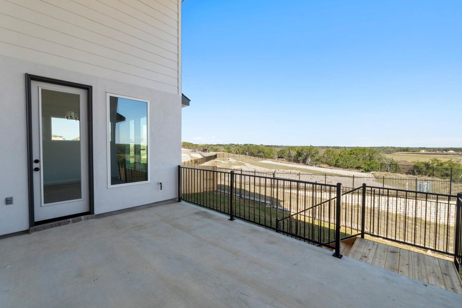 Exterior details and patio area of a home in Lariat, Liberty Hill (Image 24).