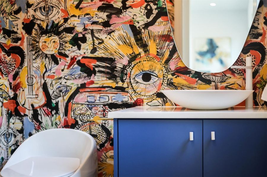 Even the guest bath gets the luxury treatment with high-end fixtures and a vibe that’s pure 78704