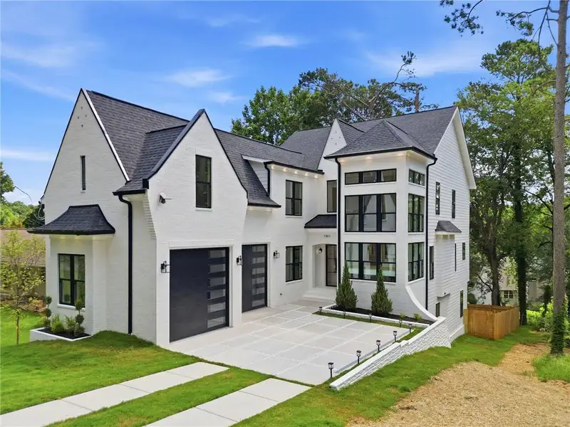 Front exterior of a new home in , Scottdale, GA, highlighting curb appeal (Image 29). Front exterior of a new home in , Scottdale, GA, highlighting curb appeal (Image 29).