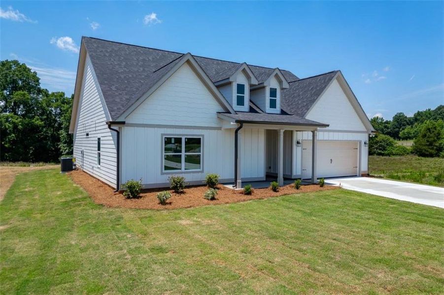 Front exterior of a new home in , Hartwell, GA, highlighting curb appeal (Image 22).