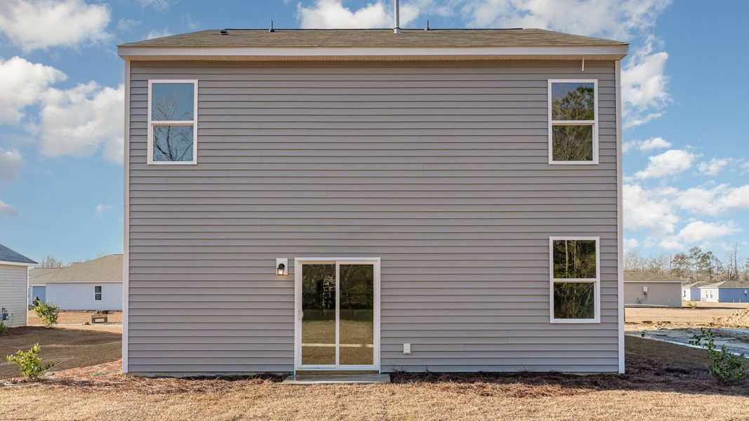 Representative exterior details of a home built from the WREN by D.R. Horton in Saltgrass Landing, Winnabow (Image 3).