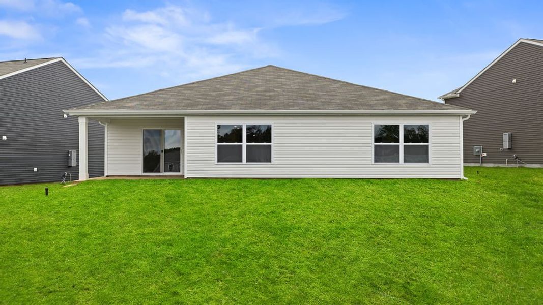 Exterior details and patio area of a home in Lakestone, Woodruff (Image 2).