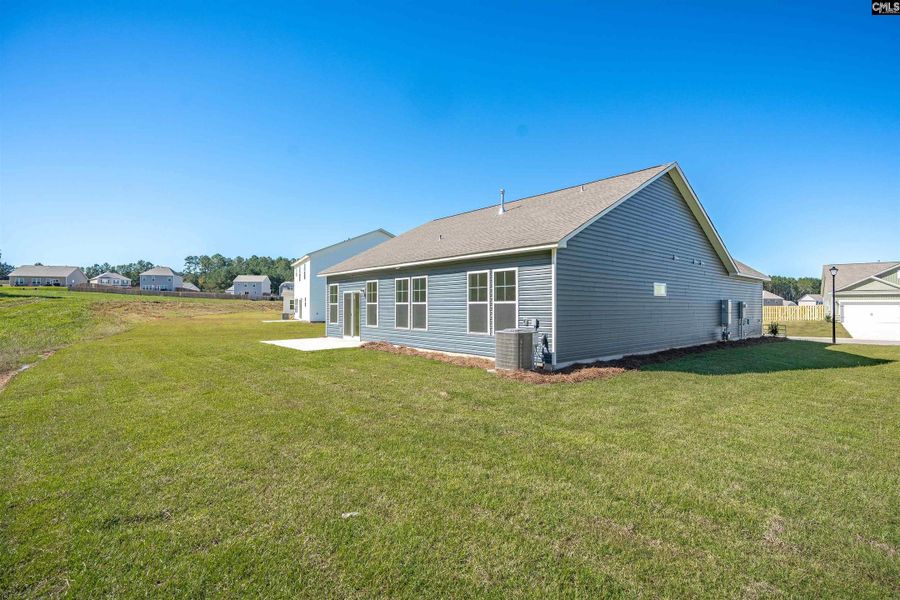 Exterior details and patio area of a home in Rolling Hills, Prosperity (Image 22).