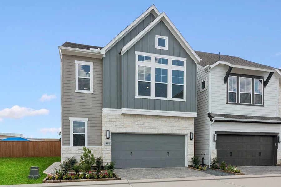 Representative exterior photo of a completed home built from the The Bermuda by David Weekley Homes in Retreat at Oak Park, Houston, TX (Image 20).