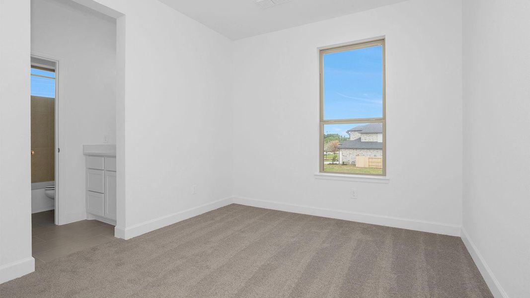 Spacious, unfurnished interior of a new home in Legacy Prairie at Katy Court, Katy (Image 10).