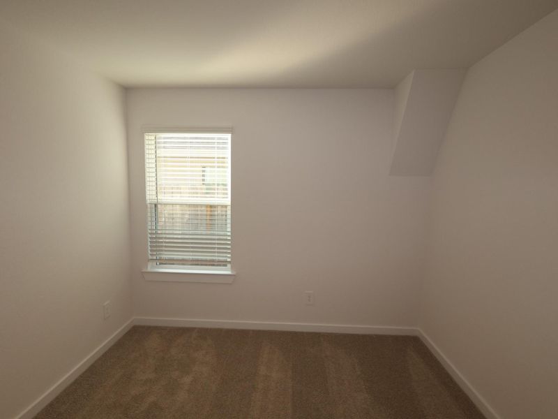 Spacious, unfurnished interior of a new home in Pinewood at Grand Texas, New Caney (Image 19).