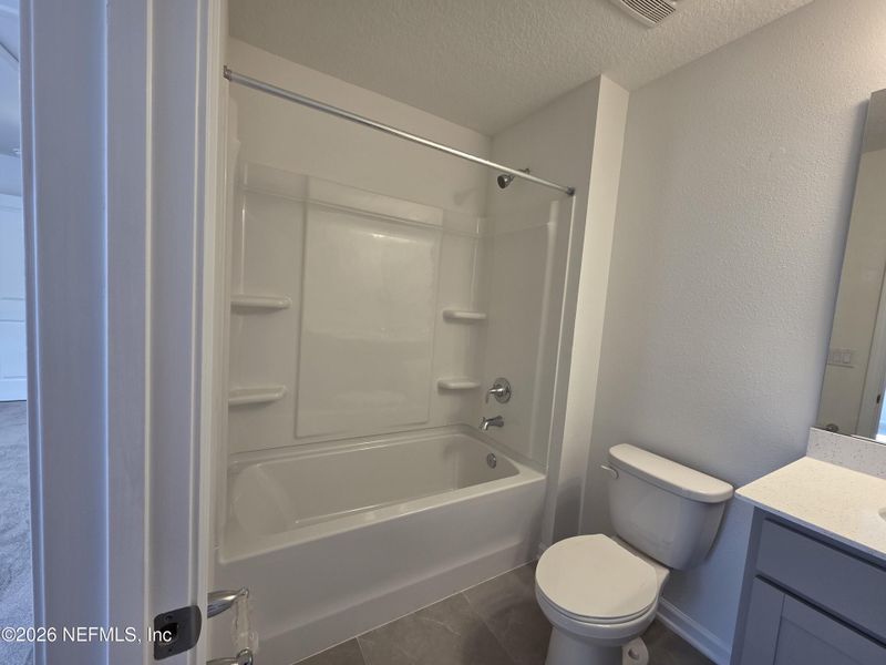 Furnished interior view inside a new home in Hyland Trail, Green Cove Springs (Image 14).