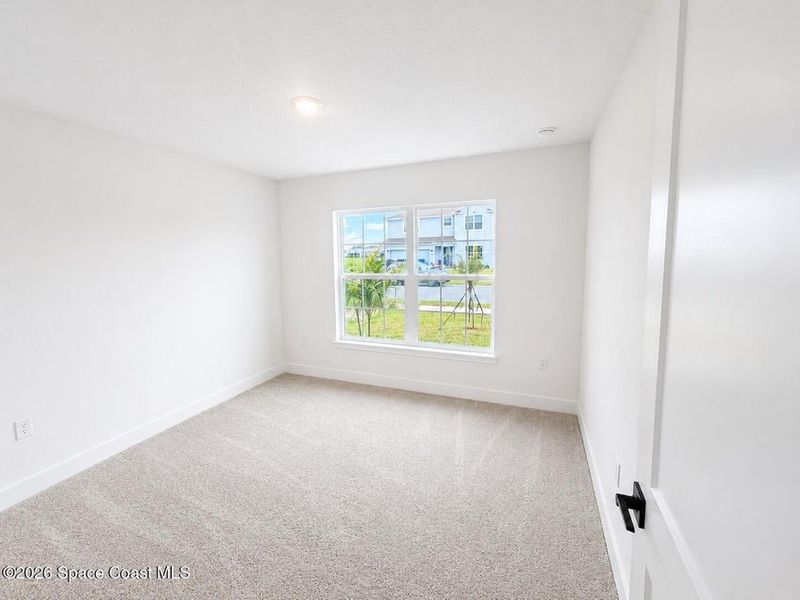 Spacious, unfurnished interior of a new home in St. John's Preserve, Palm Bay (Image 20).