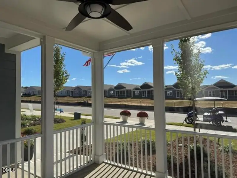 Exterior details and patio area of a home in The Walk at East Village, Clayton (Image 3).