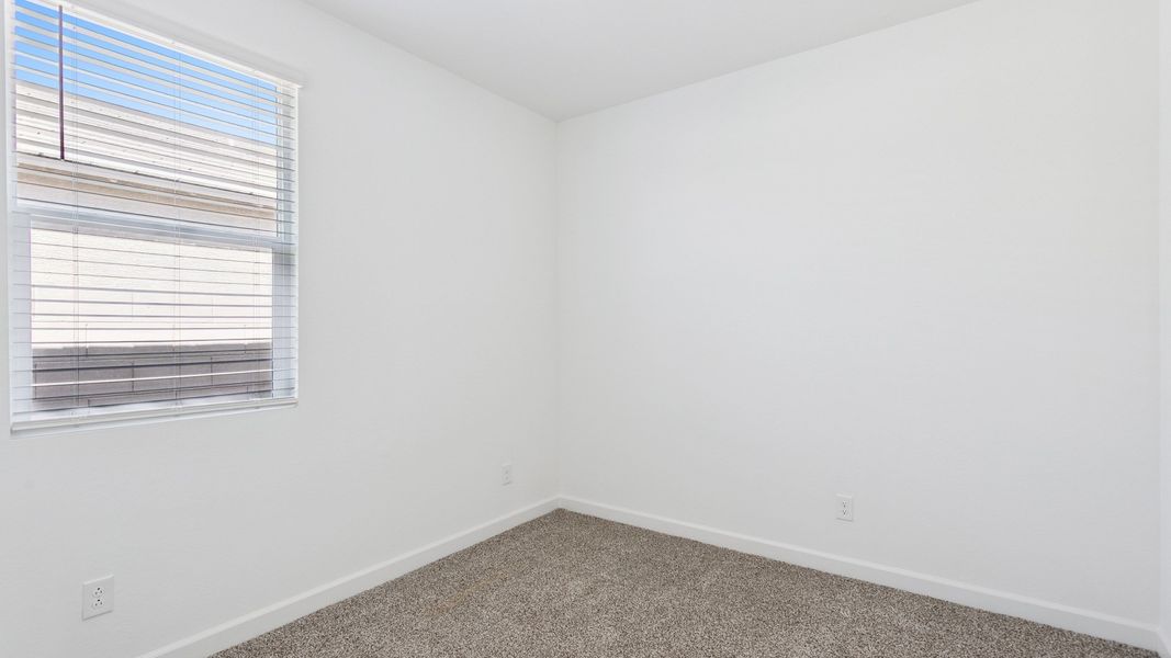 Spacious, unfurnished interior of a new home in Elena Trails, Maricopa (Image 26).