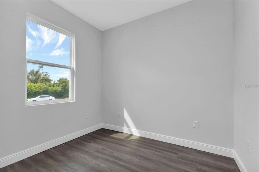 Spacious, unfurnished interior of a new home in , Port Charlotte (Image 10).