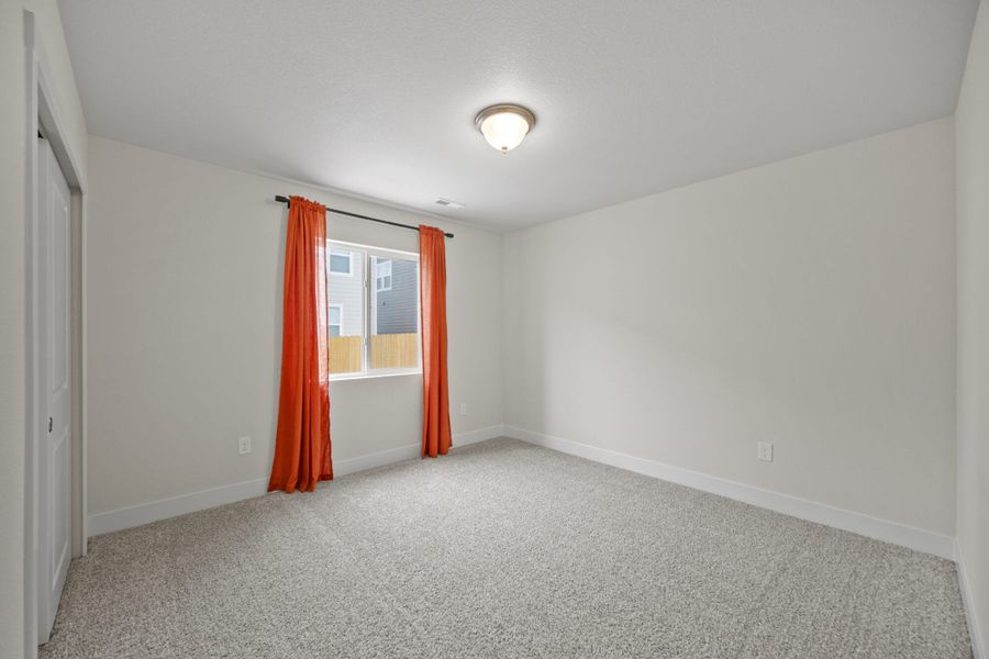Spacious, unfurnished interior of a new home in Ridge at Lorson Ranch, Colorado Springs (Image 20).