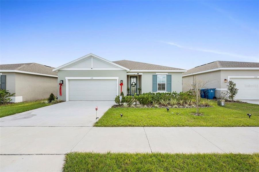 Front exterior of a new home in , Lake Wales, FL, highlighting curb appeal (Image 30). Front exterior of a new home in , Lake Wales, FL, highlighting curb appeal (Image 30).