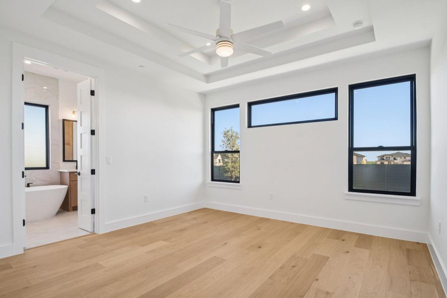 Spacious, unfurnished interior of a new home in Milky Way at River Place, Austin (Image 18).