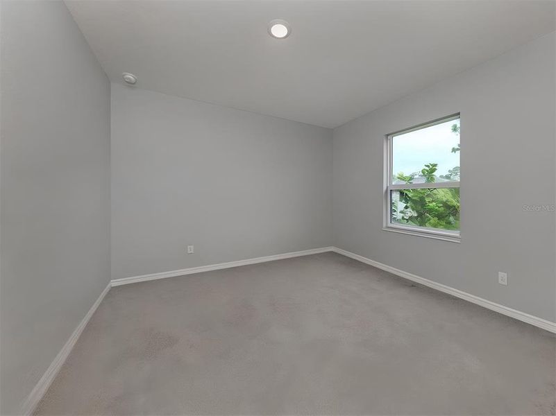 Spacious, unfurnished interior of a new home in , Port Charlotte (Image 21).