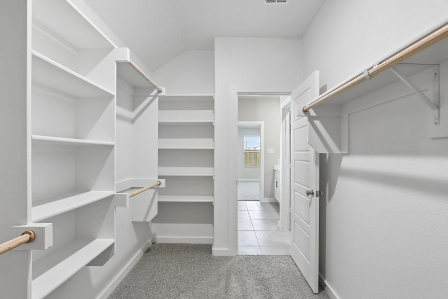 Walk In Closet in the Oscar home plan by Trophy Signature Homes