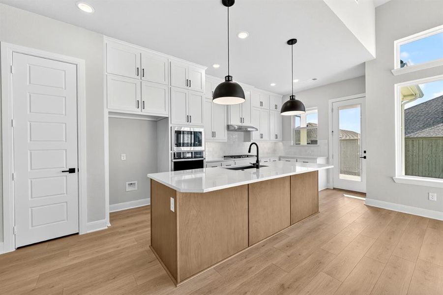 Furnished interior view inside a new home in Pecan Square - Gardens, Northlake (Image 9). Furnished interior view inside a new home in Pecan Square - Gardens, Northlake (Image 9).