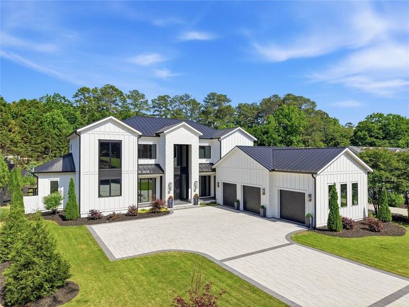 Front exterior of a new home in , Roswell, GA, highlighting curb appeal (Image 26). Front exterior of a new home in , Roswell, GA, highlighting curb appeal (Image 26).
