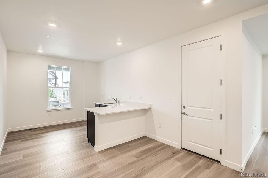 Furnished interior view inside a new home in Sunset Village: The Grand Collection, Erie (Image 6). Furnished interior view inside a new home in Sunset Village: The Grand Collection, Erie (Image 6).