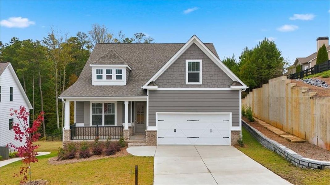 Front exterior of a new home in , Dallas, GA, highlighting curb appeal (Image 2).