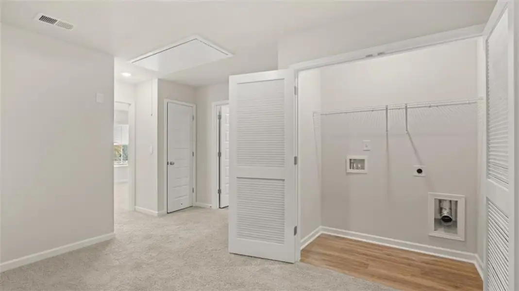 Spacious, unfurnished interior of a new home in Brookland Commons, Monroe (Image 24).