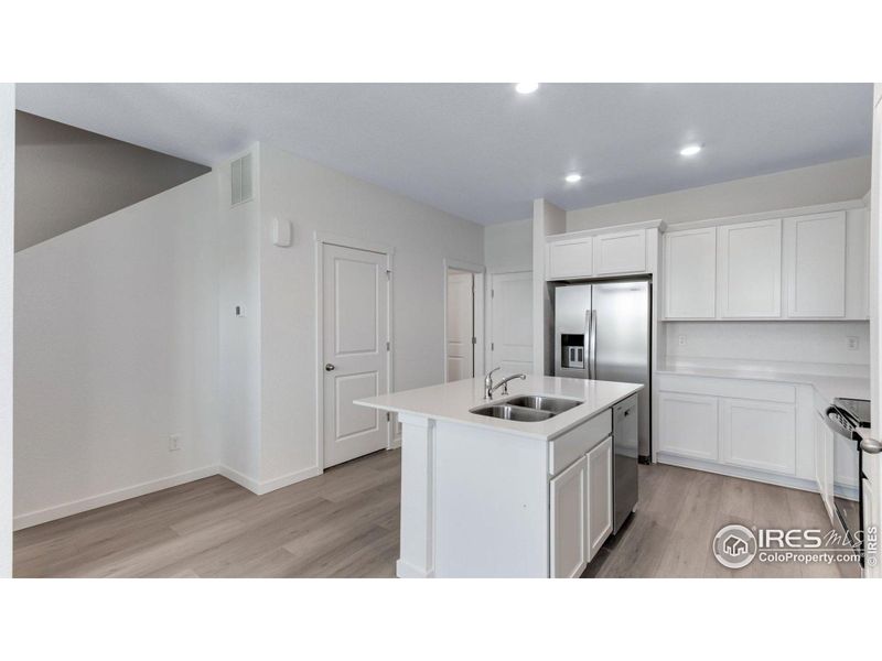 Furnished interior view inside a new home in Vista Meadows, Fort Lupton (Image 7).