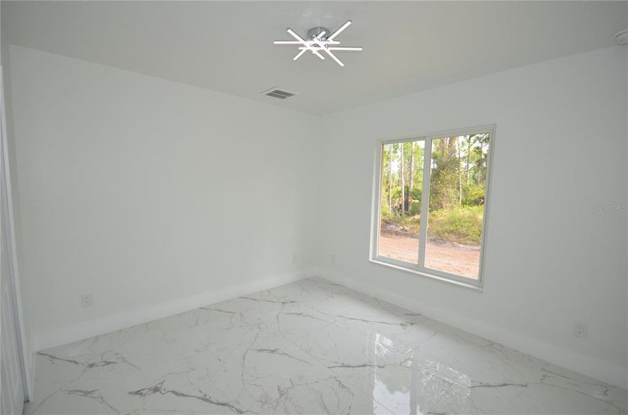 Spacious, unfurnished interior of a new home in , Lehigh Acres (Image 8).