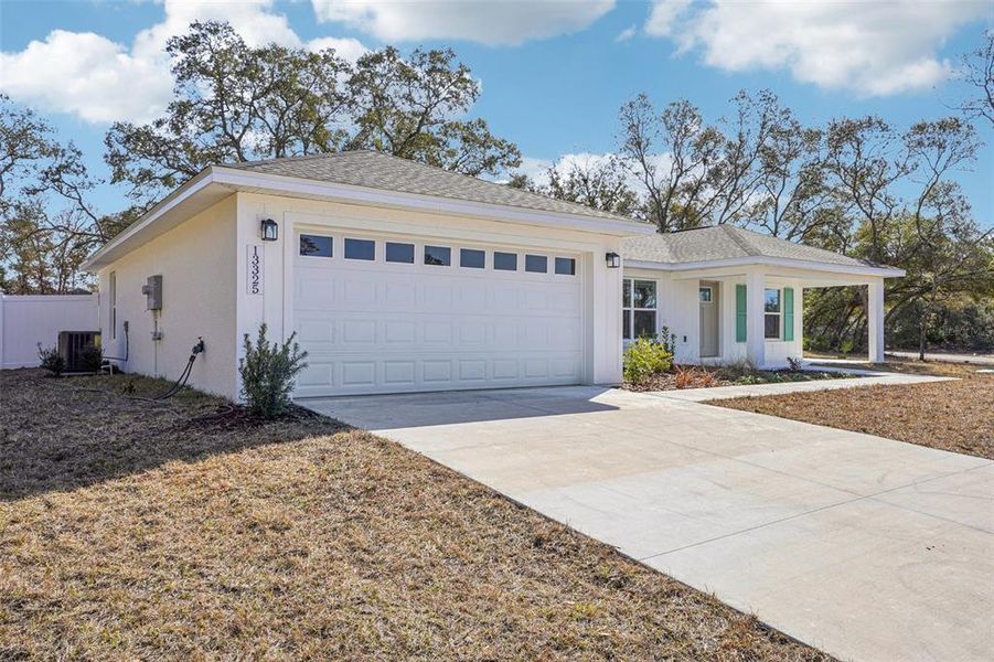 Front exterior of a new home in , Ocala, FL, highlighting curb appeal (Image 32). Front exterior of a new home in , Ocala, FL, highlighting curb appeal (Image 32).