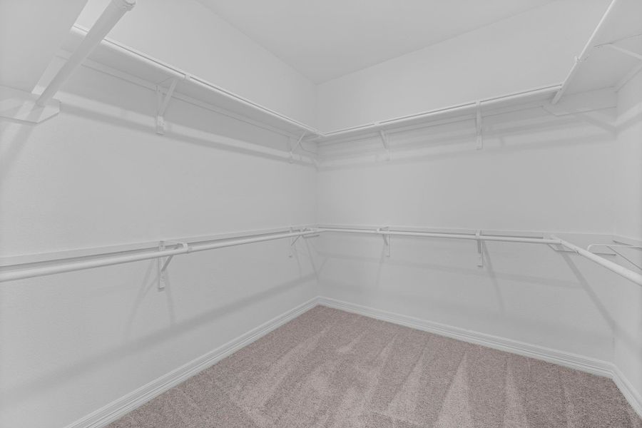 A view of your large primary walk-in Closet A view of your large primary walk-in Closet