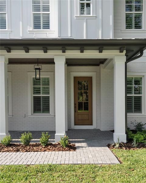 Front exterior of a new home in , St. Petersburg, FL, highlighting curb appeal (Image 1).