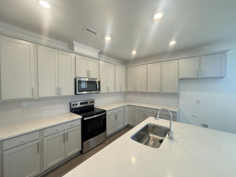 Furnished interior view inside a new home in Daniel Farms, Benson (Image 8).