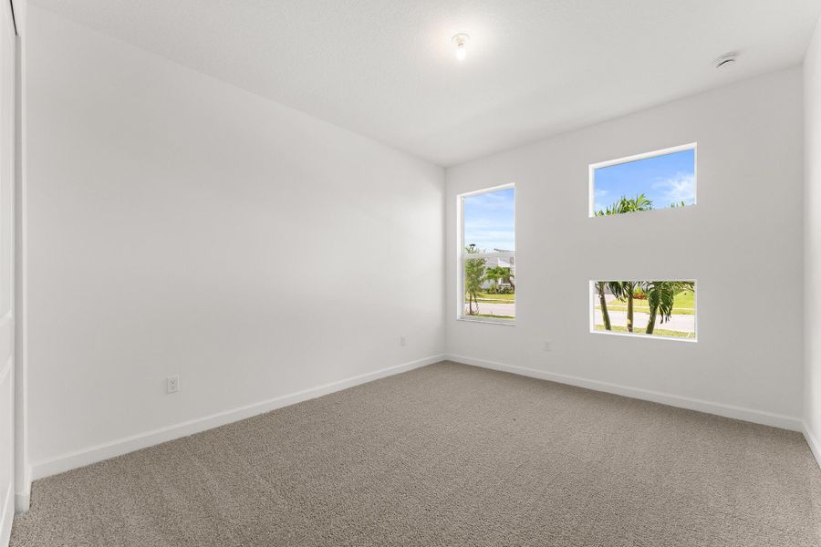 Spacious, unfurnished interior of a new home in Tradition - Telaro, Port St. Lucie (Image 9).