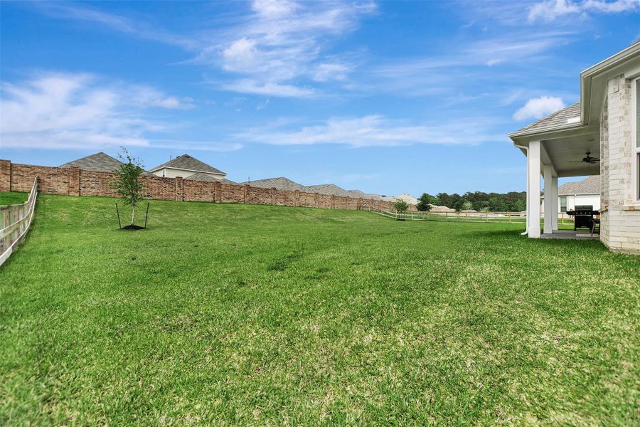 Exterior details and patio area of a home in Lone Star Landing, Montgomery (Image 26).