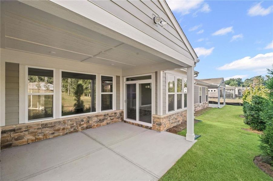 Front exterior of a new home in Laurel Farms, Dallas, GA, highlighting curb appeal (Image 25). Front exterior of a new home in Laurel Farms, Dallas, GA, highlighting curb appeal (Image 25).