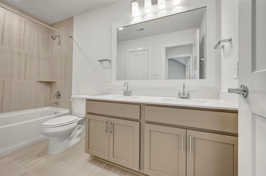 Furnished interior view inside a new home in The Oaks on 6th Street, Magnolia (Image 7).