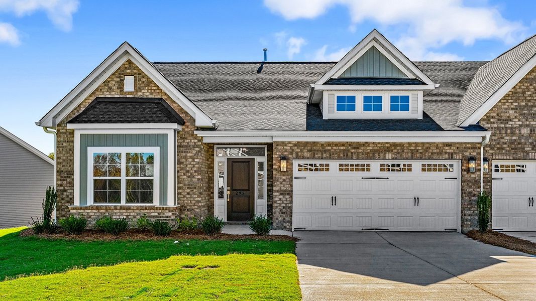 Front exterior of a new home in Fieldstone, Lexington, NC, highlighting curb appeal (Image 1).