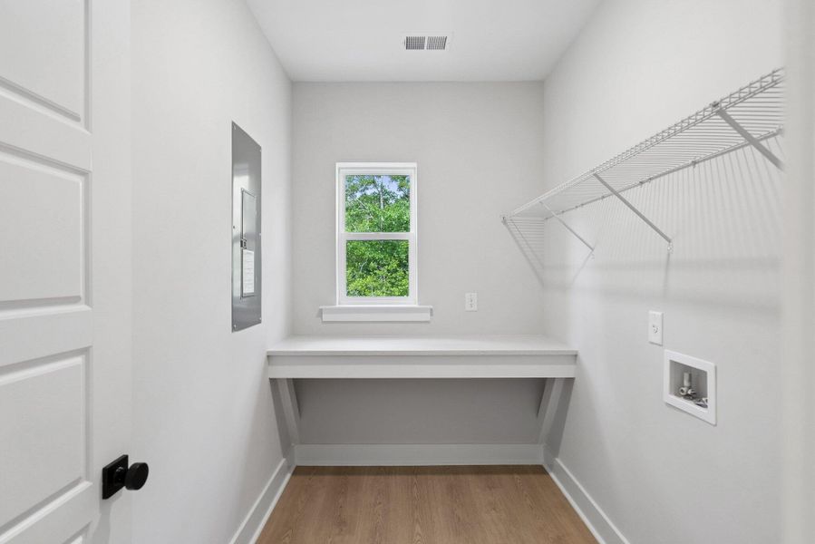 Spacious, unfurnished interior of a new home in Hidden Ponds Reserve, Awendaw (Image 10).