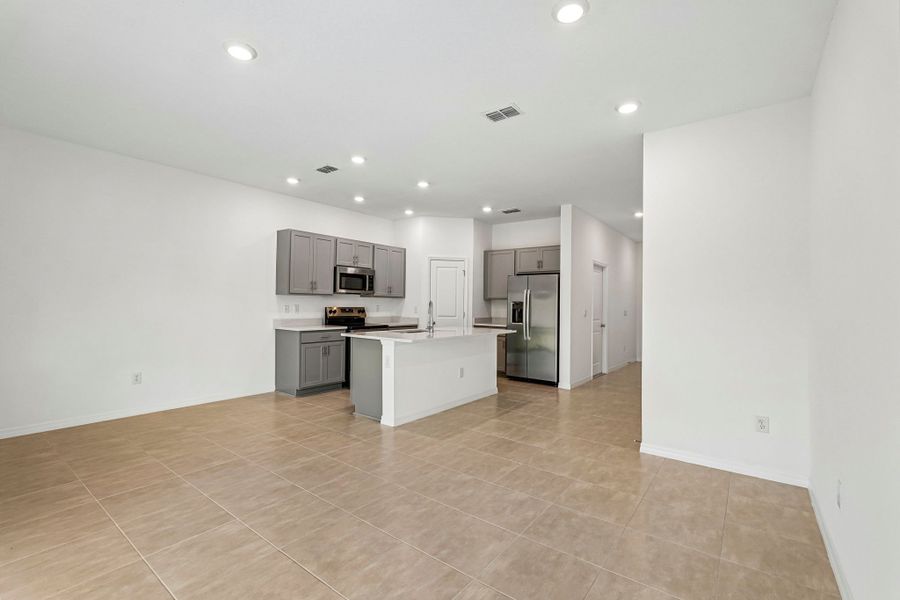 Furnished interior view inside a new home in The Towns at Tiburon, Nokomis (Image 6).